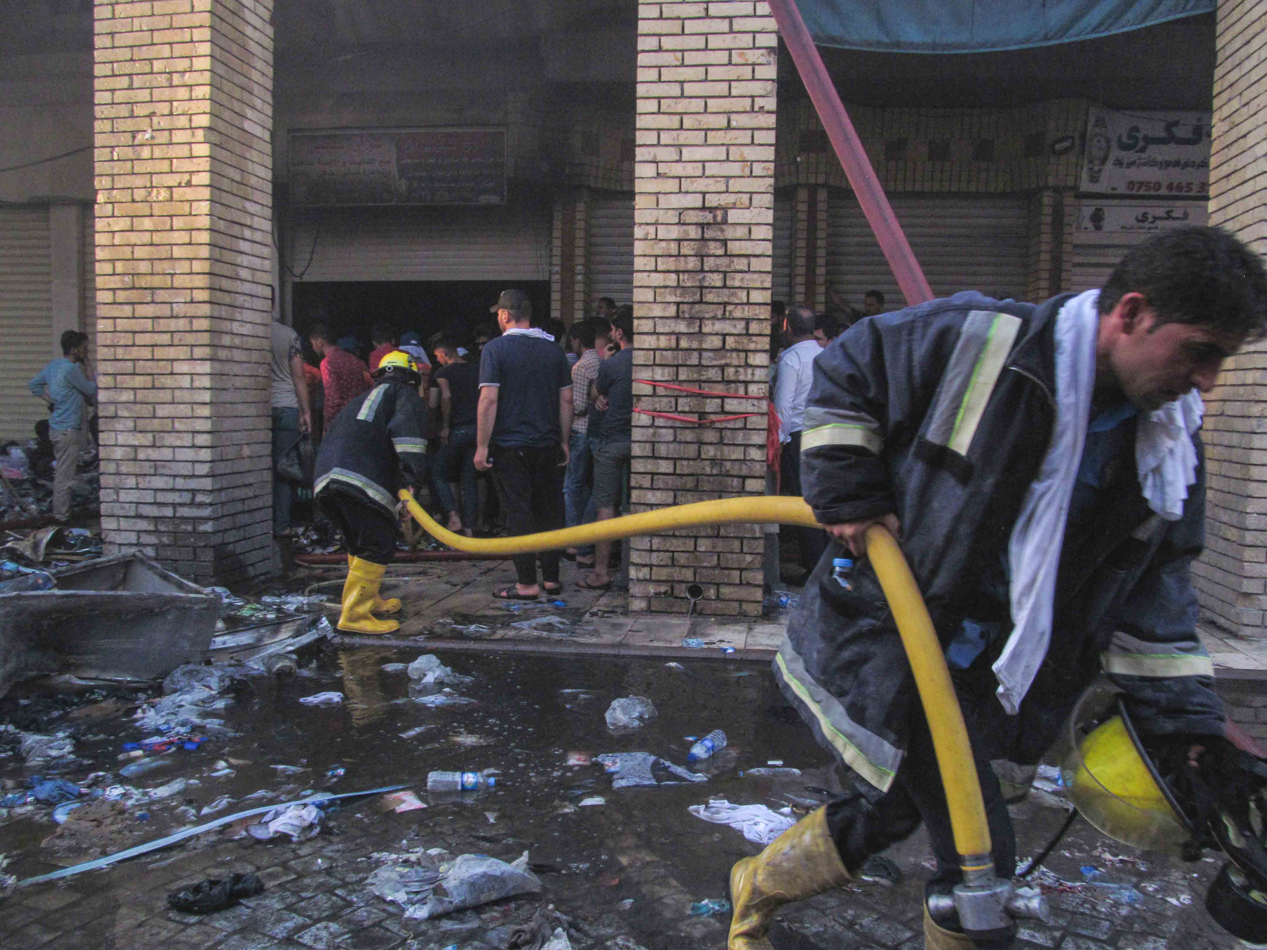 PHOTOS: Firefighters extinguish blaze in Erbil's old market 